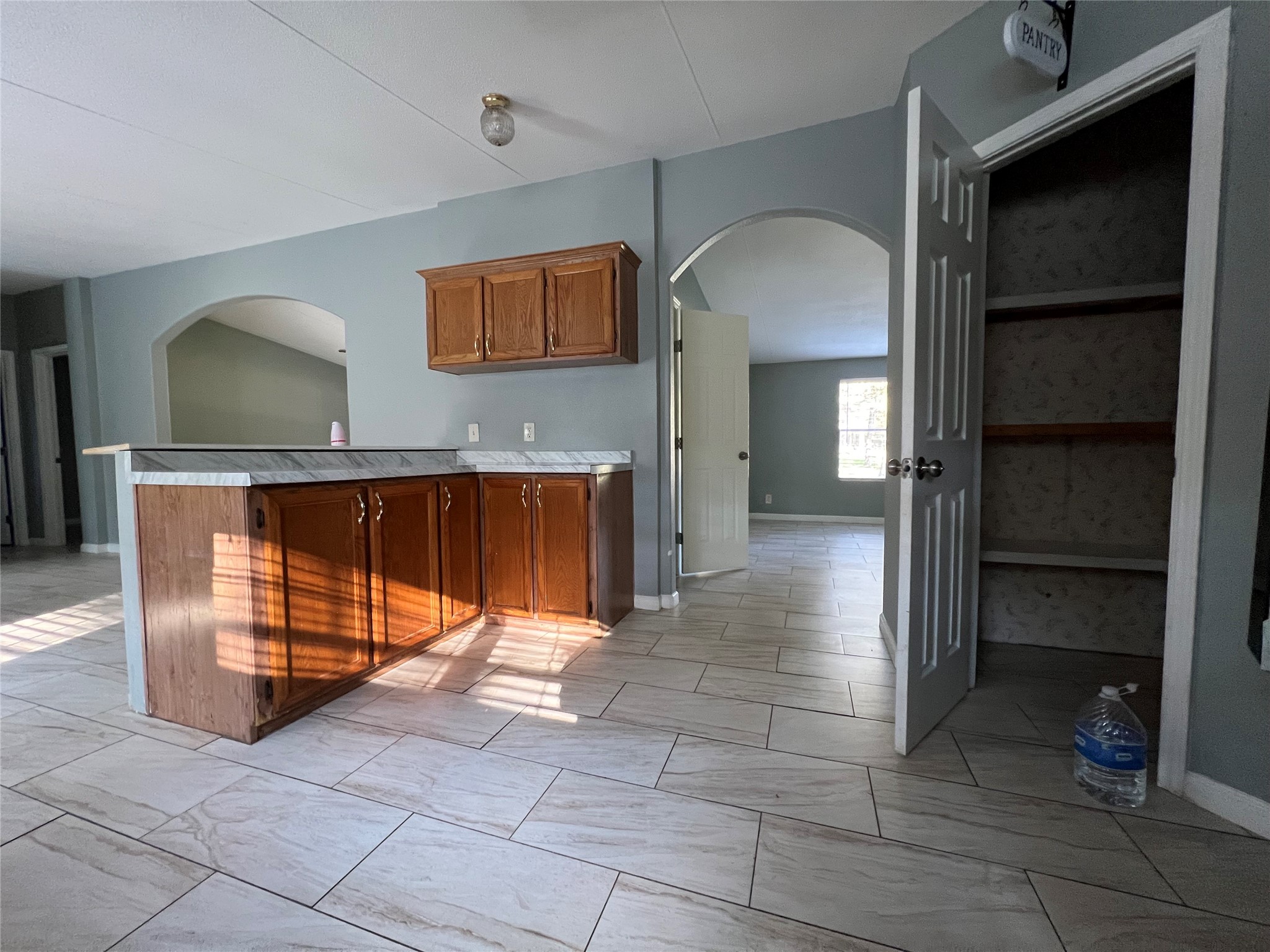 66 McFaddin Road Huntsville, TX 77340 - Photo 16 of 22 a view of a room with a fireplace and cabinet