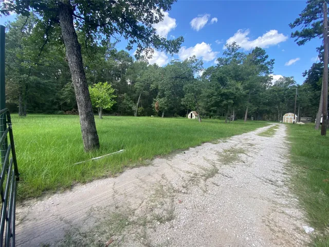 a view of a park and basketball court