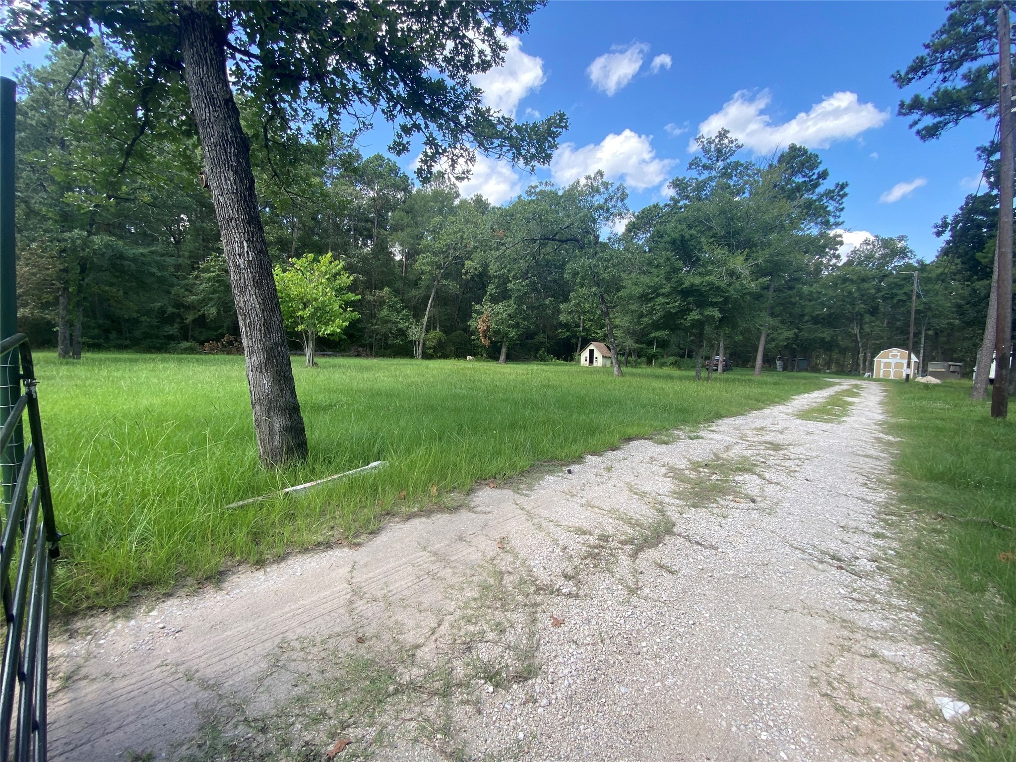 66 McFaddin Road Huntsville, TX 77340 - Photo 2 of 22 a view of a park and basketball court