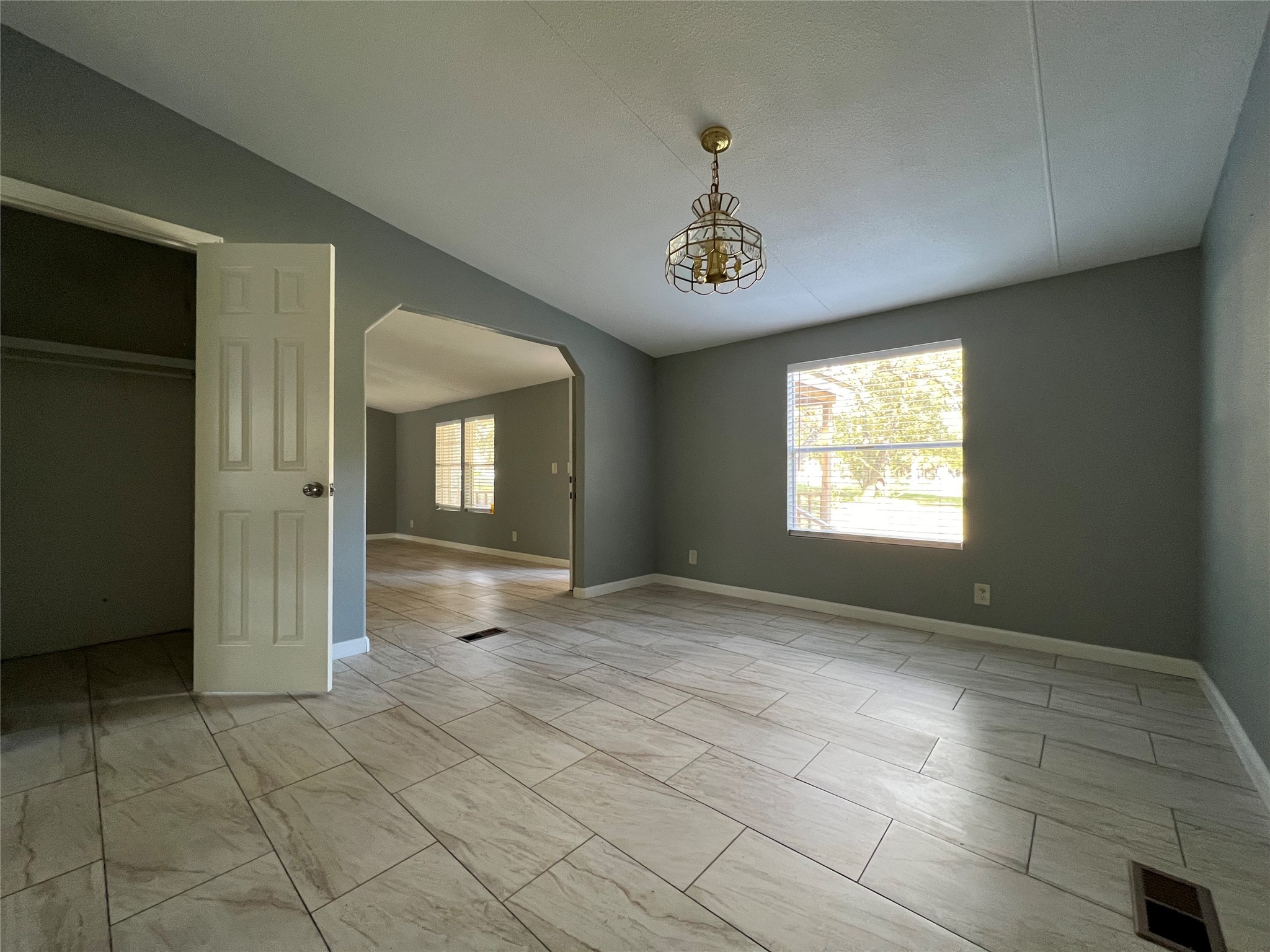 66 McFaddin Road Huntsville, TX 77340 - Photo 9 of 22 a view of an empty room with a window