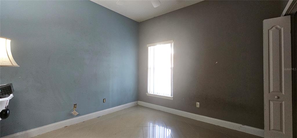 10927 Leader Lane Orlando, FL 32825 - Photo 21 of 29 a view of empty room with window