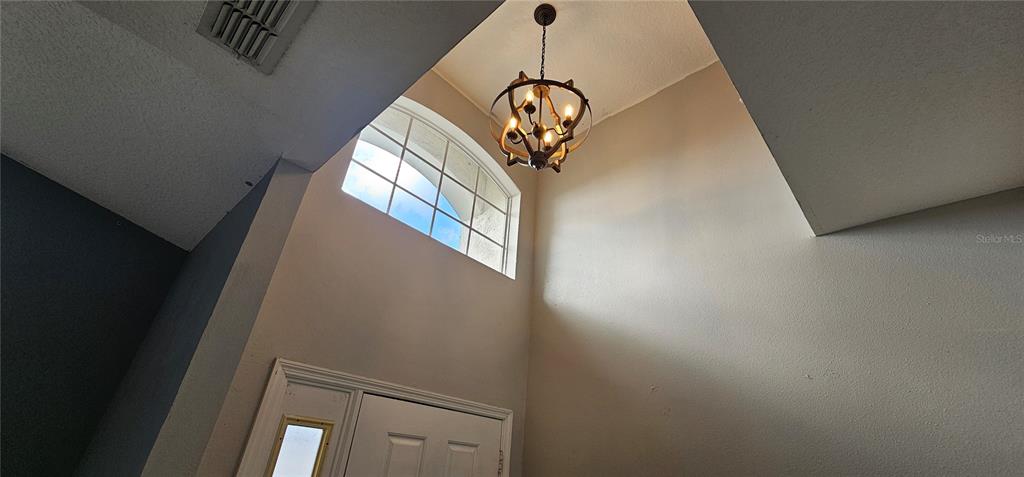 10927 Leader Lane Orlando, FL 32825 - Photo 4 of 29 a view of mirror in a room