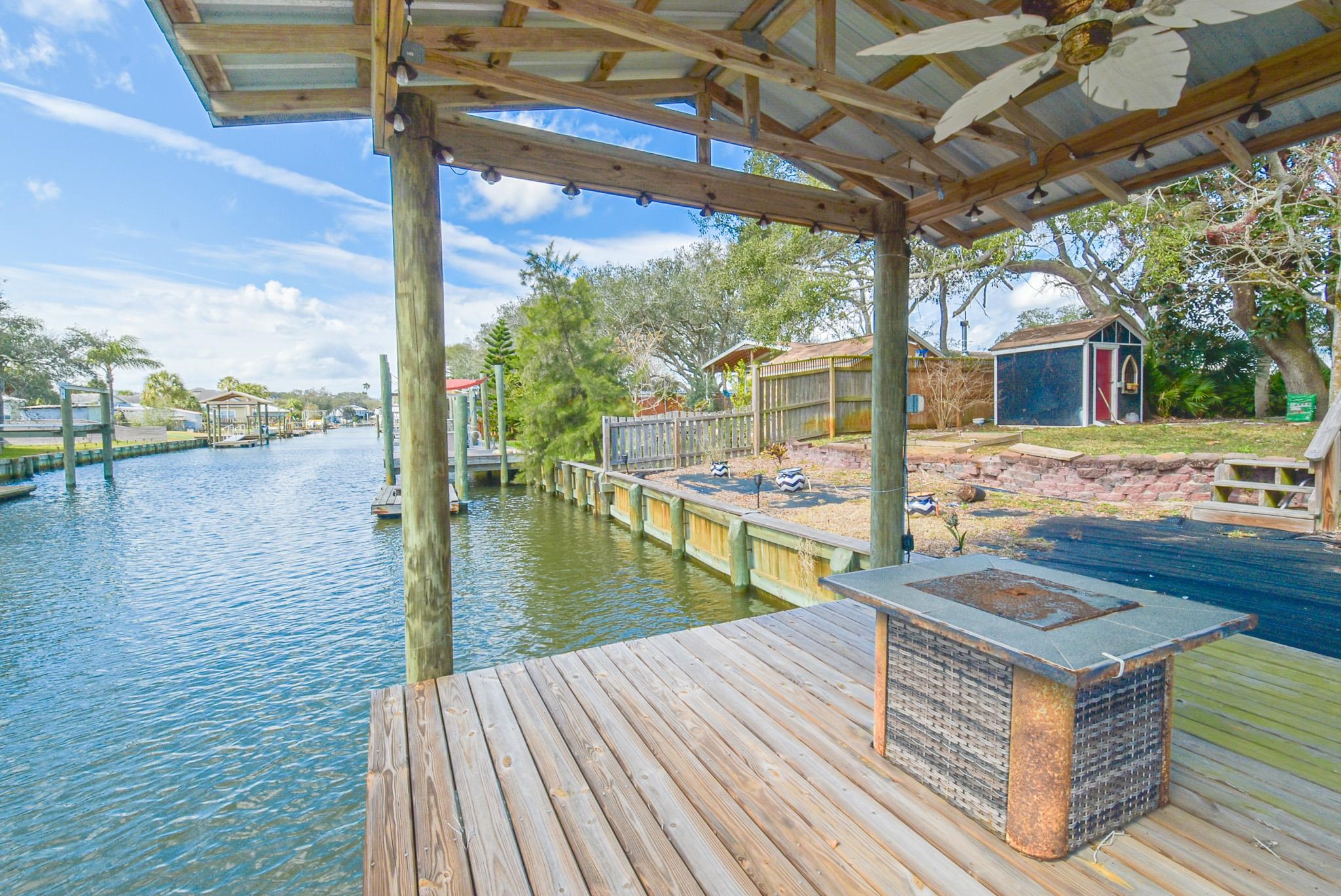 231 Puebla Road St. Augustine, FL 32080 - Photo 8 of 54 Dock featuring a water view and an outdoor fire pit
