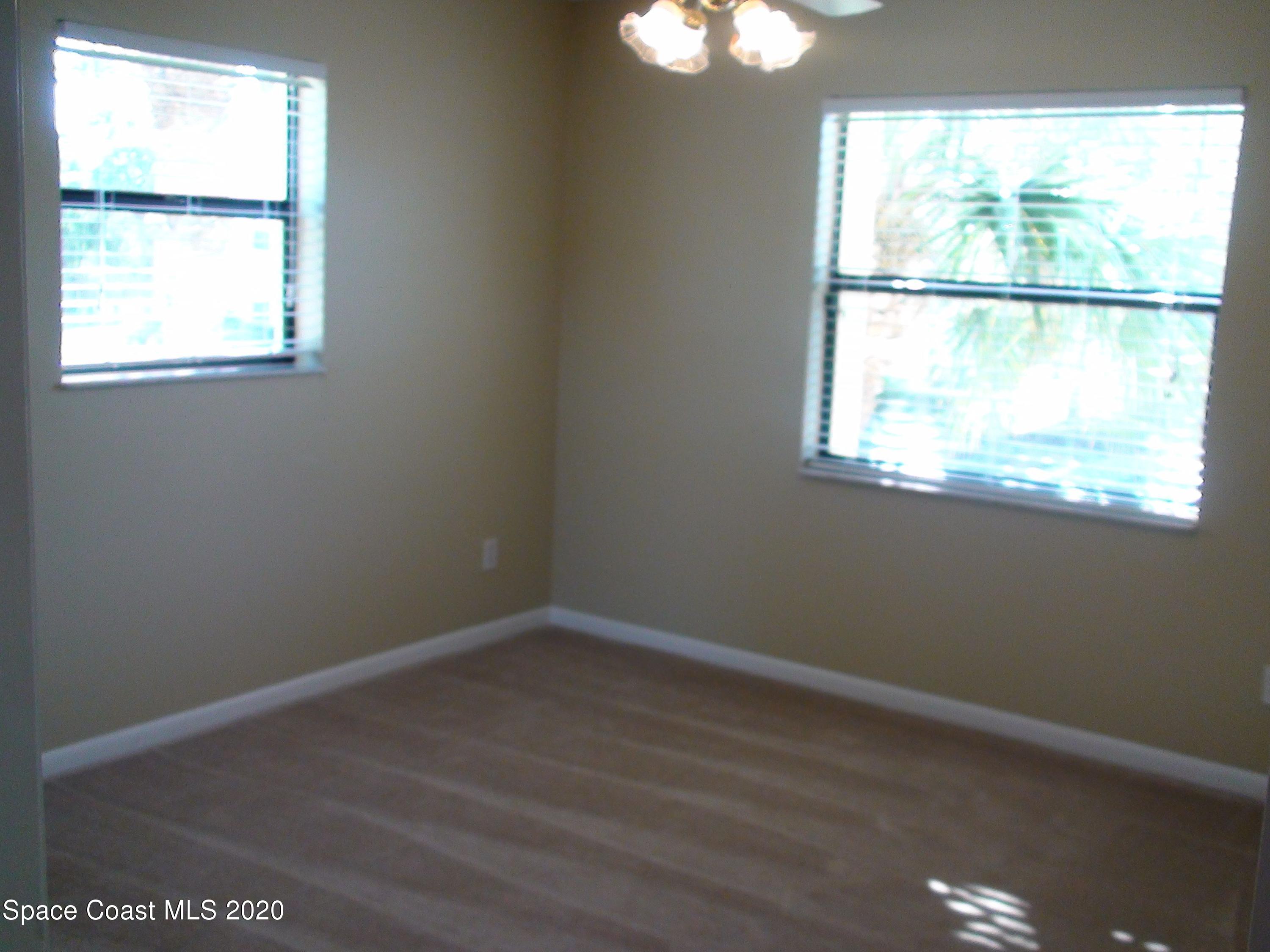 598 North Wickham Road, Unit 80 Melbourne, FL 32935 - Photo 7 of 18 598 N Wickham Rd Unit 80 Bedroom2