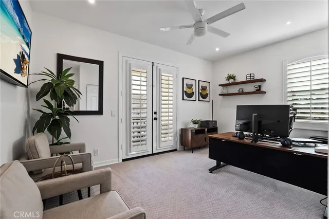 a view of a house with swimming pool and furniture