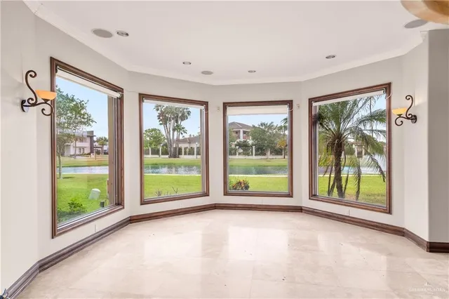 a view of an empty room with front door