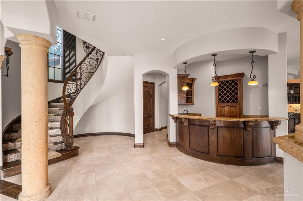 4405 South "H" Street McAllen, TX 78503 - Photo 16 of 33 a view of a kitchen with furniture and staircase