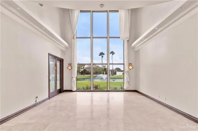 a view of a room with a large window