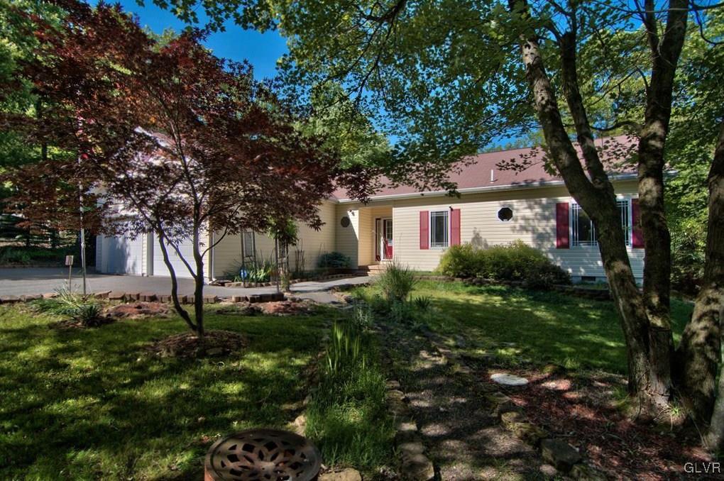 192 Chetco Road Albrightsville, PA 18210 - Photo 3 of 46 The house is surrounded by mature trees and landsc