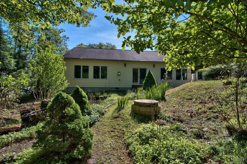 192 Chetco Road Albrightsville, PA 18210 - Photo 36 of 46 View of the tree-lined yard with mature landscapin