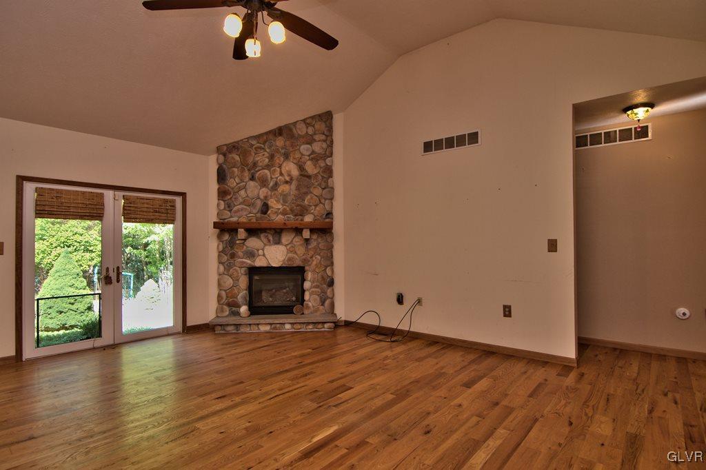 192 Chetco Road Albrightsville, PA 18210 - Photo 5 of 46 The living room has a 13' vaulted ceiling and a Fr