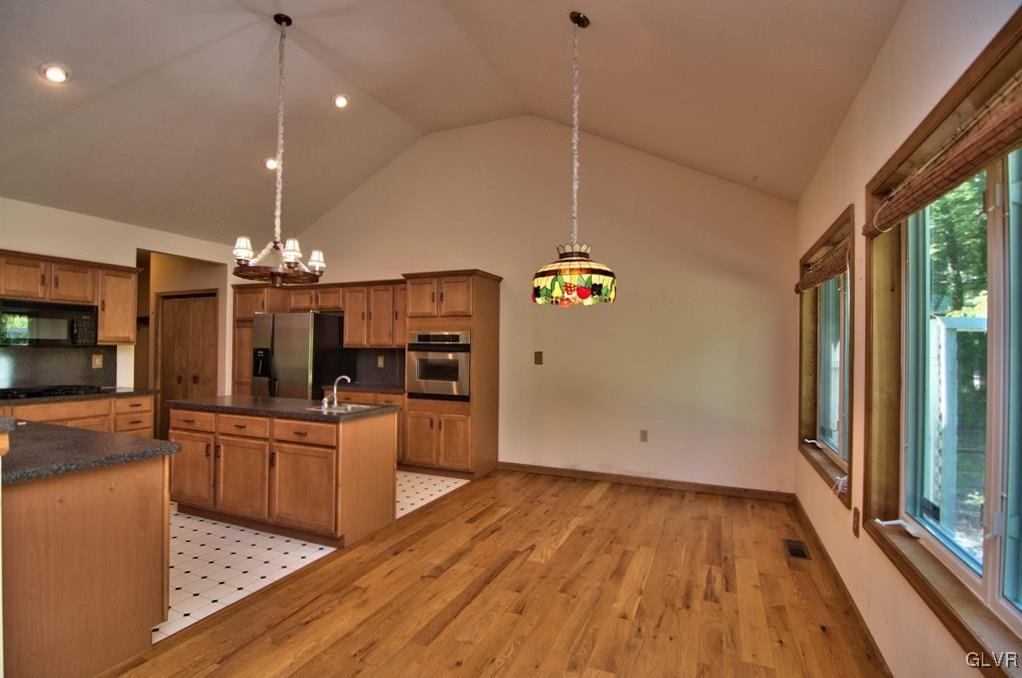 192 Chetco Road Albrightsville, PA 18210 - Photo 7 of 46 The dining area is light & bright with a vaulted c