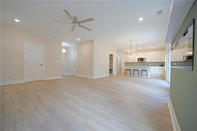 a view of kitchen with wooden floor