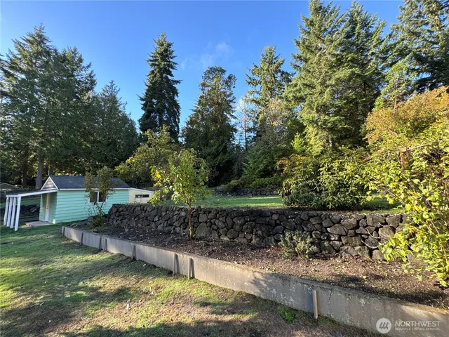 a view of house with a swimming pool