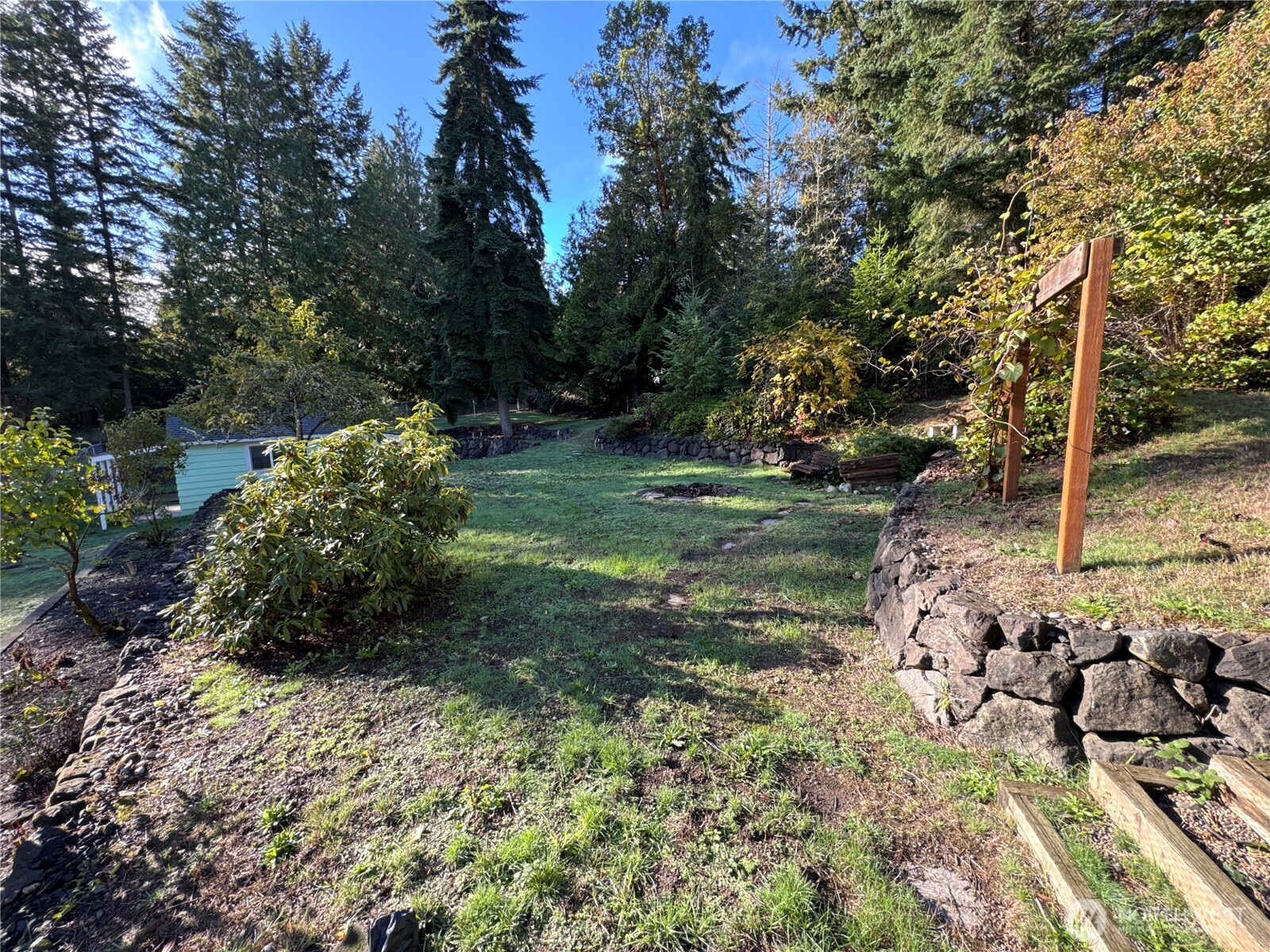 0 Illahee Road Northeast Bremerton, WA 98311 - Photo 10 of 15 a view of a garden with a tree