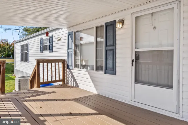 a front view of a house with a porch