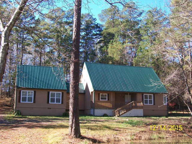 500 Huckabee Road Gray, GA 31032 - Photo 1 of 17 a front view of a house with garden