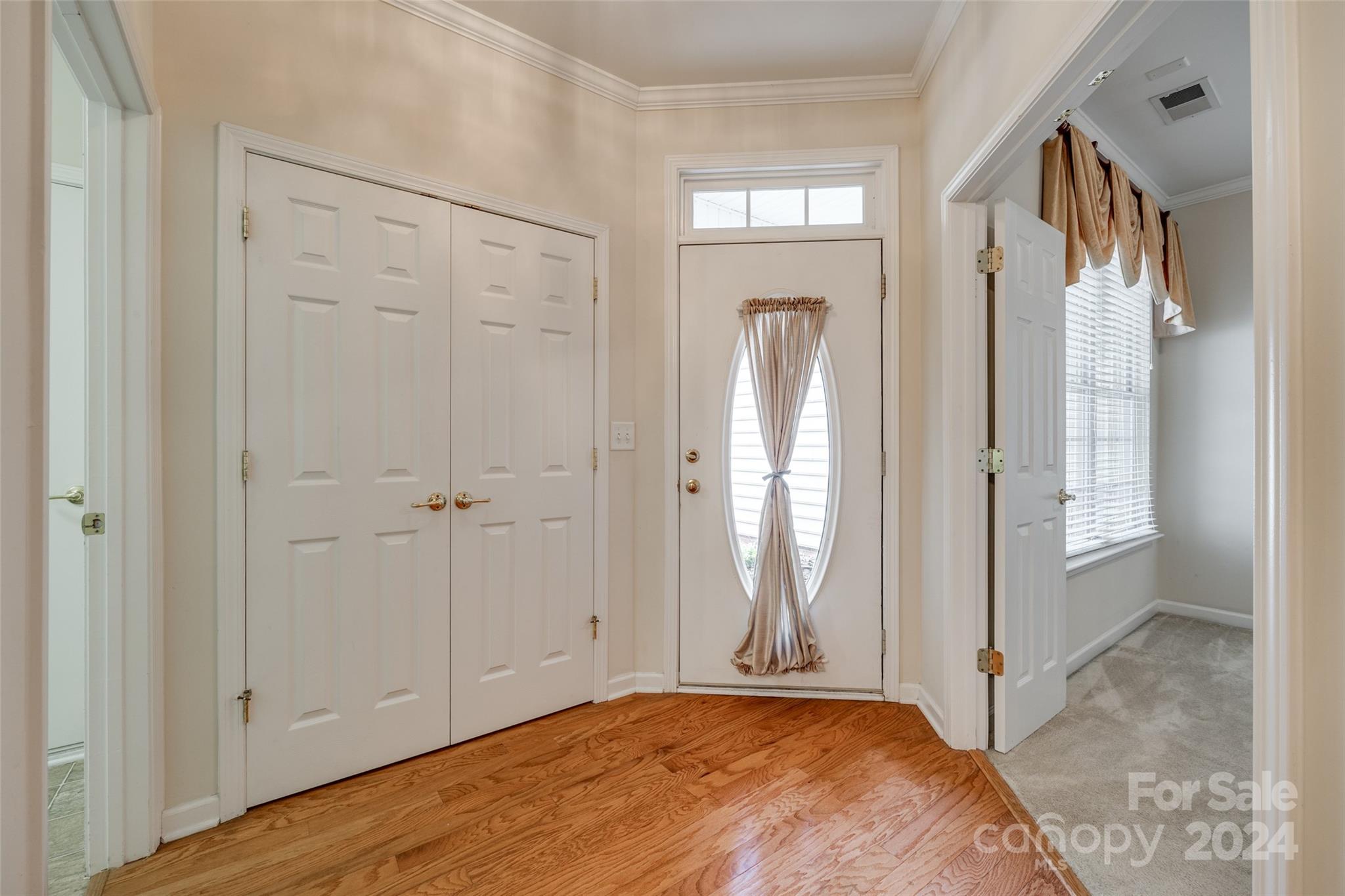 1671 Onyx Ridge Fort Mill, SC 29708 - Photo 3 of 38 a view of a livingroom with wooden floor and a bathroom