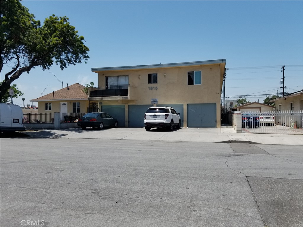1815 Locust Avenue, Unit 8 Long Beach, CA 90806 - Photo 1 of 6 a car parked in front of house