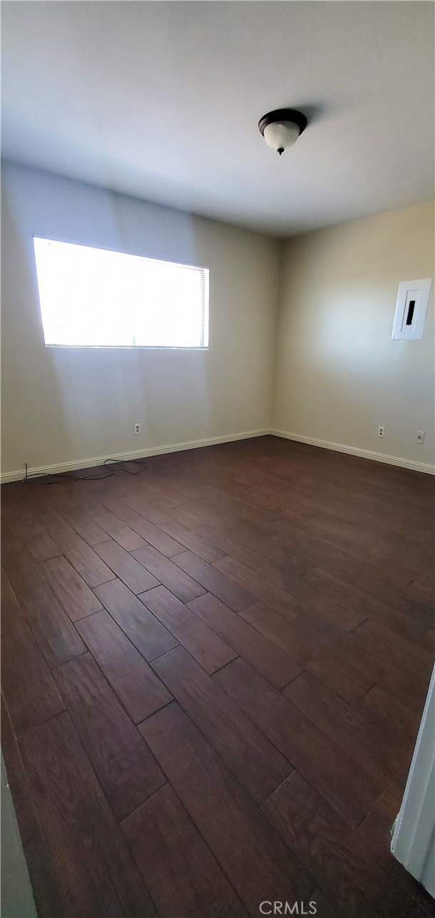 1815 Locust Avenue, Unit 8 Long Beach, CA 90806 - Photo 5 of 6 an empty room with a window