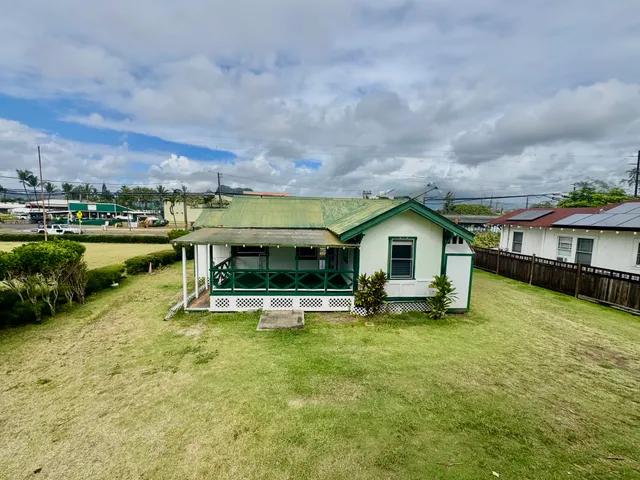 a house view with a garden space