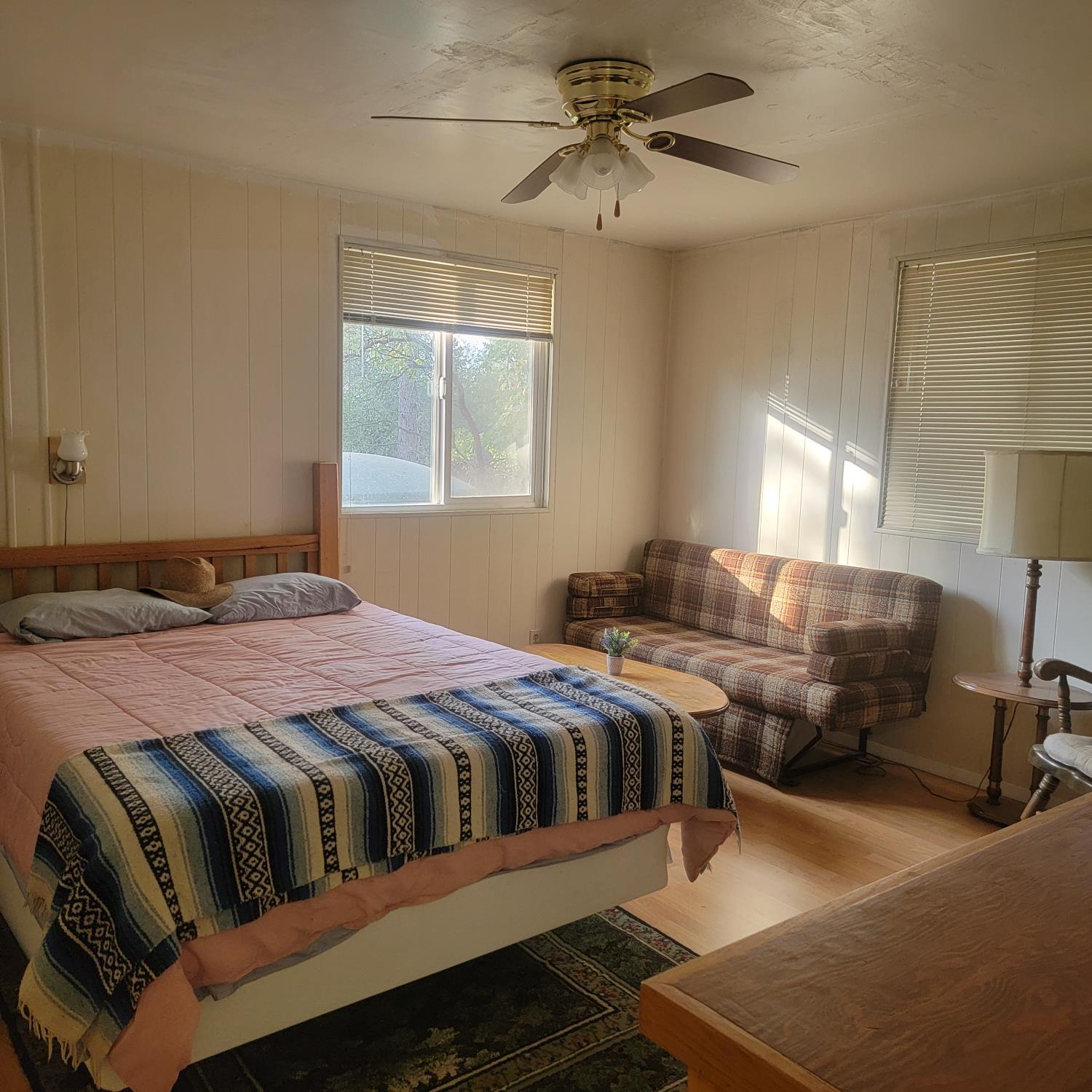 13021 Ridge View Drive Sutter Creek, CA 95685 - Photo 18 of 35 a bedroom with a bed and wooden floor