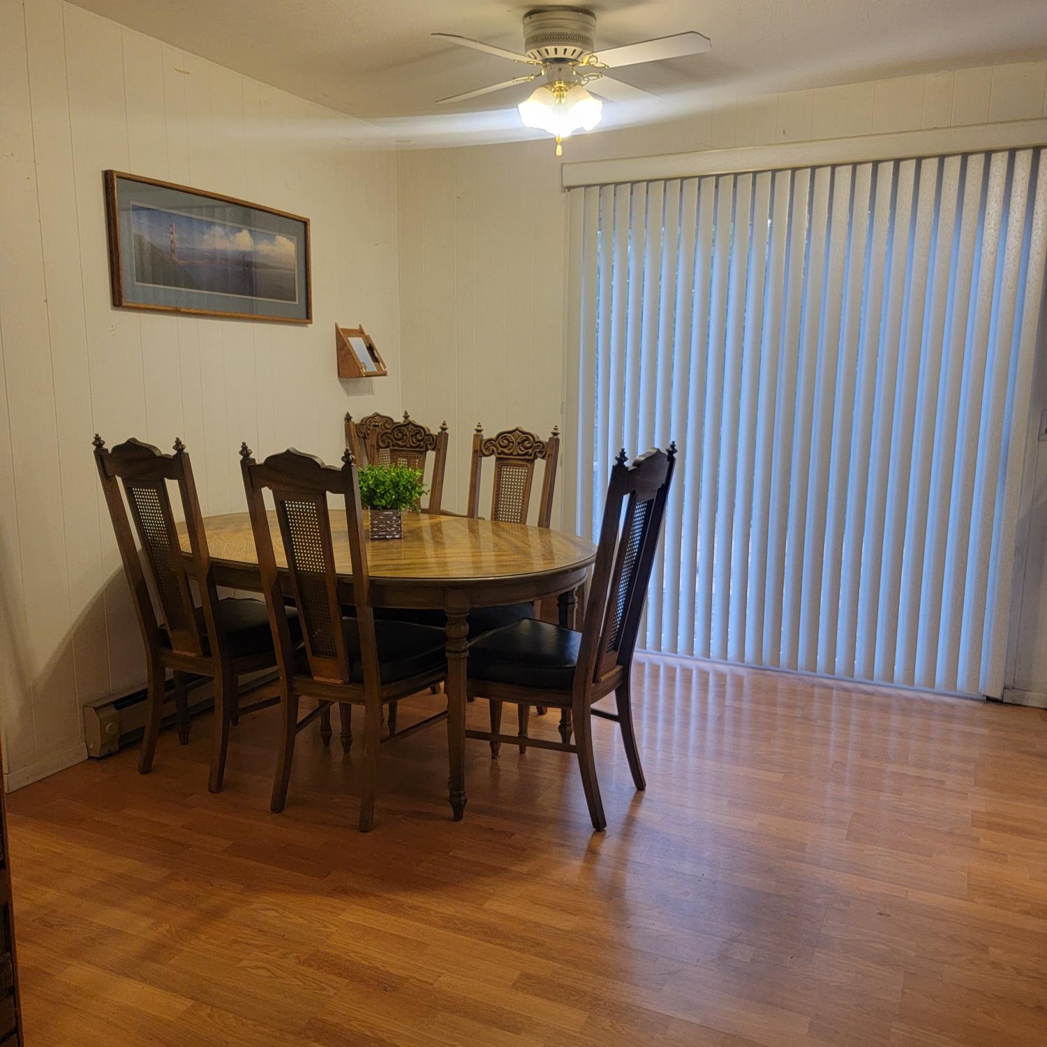13021 Ridge View Drive Sutter Creek, CA 95685 - Photo 10 of 35 a view of a dining room with furniture and wooden floor