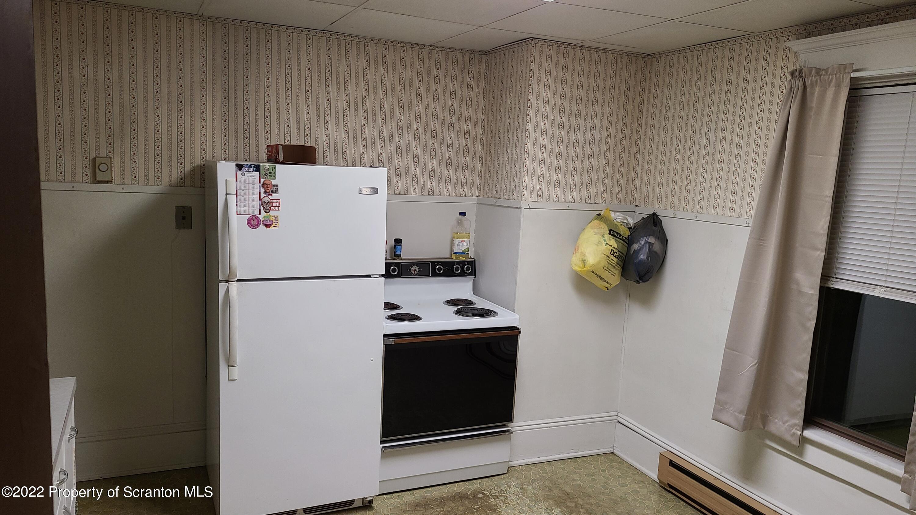 418 North Main Street Simpson, PA 18407 - Photo 17 of 19 a utility room with dryer and washer