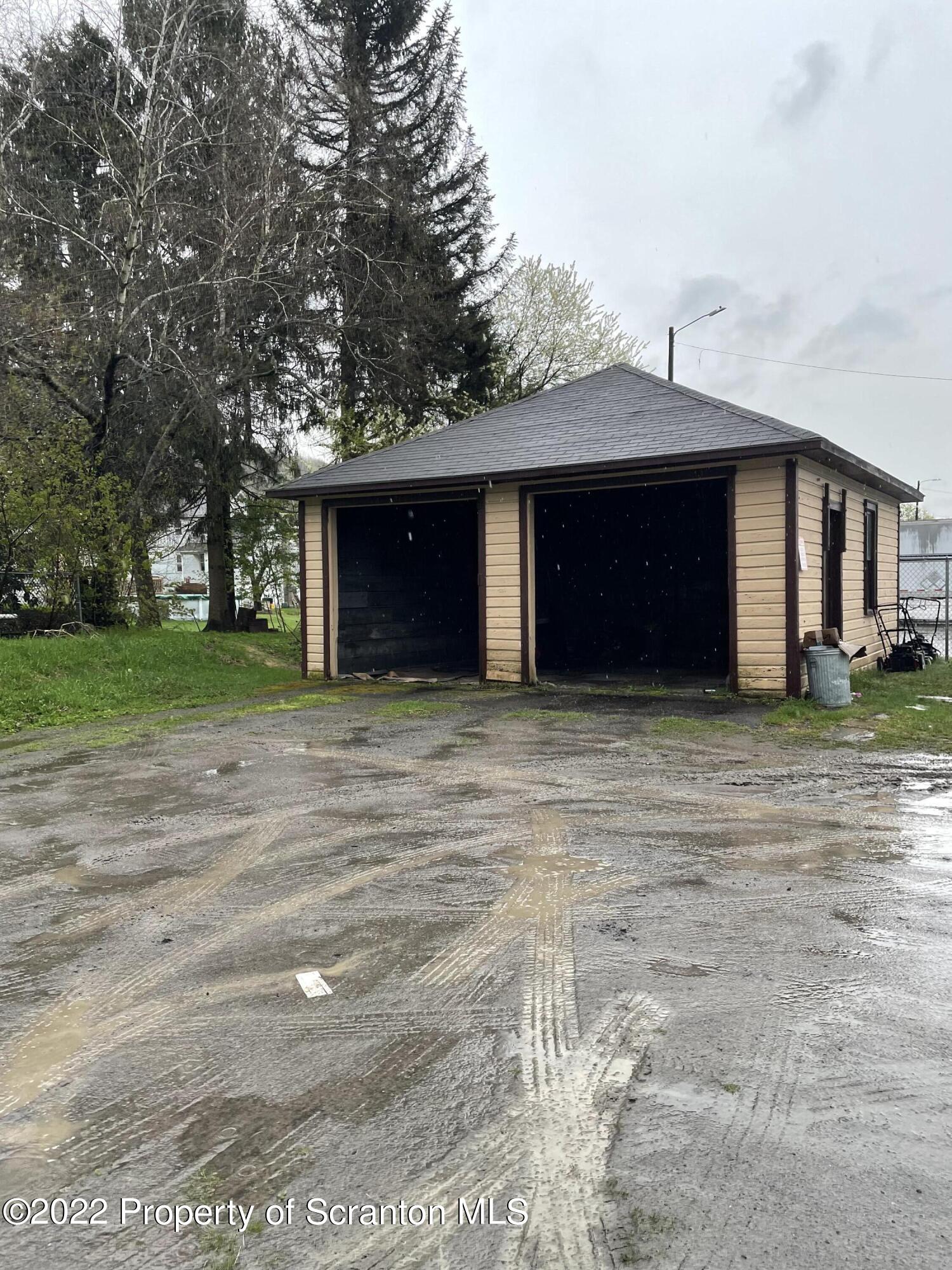 418 North Main Street Simpson, PA 18407 - Photo 5 of 19 a view of a house with a yard