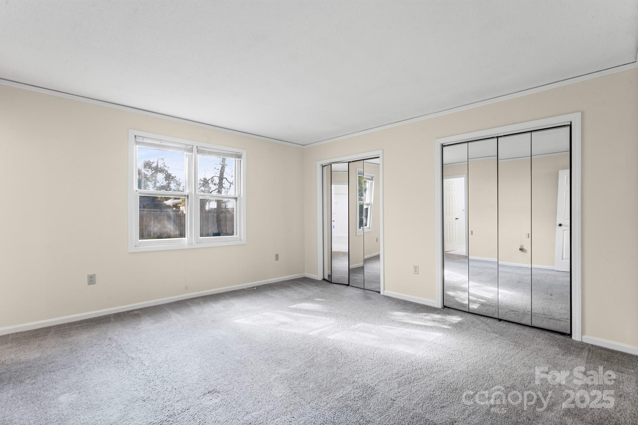 331 Meadowbrook Road Charlotte, NC 28211 - Photo 13 of 32 an empty room with windows