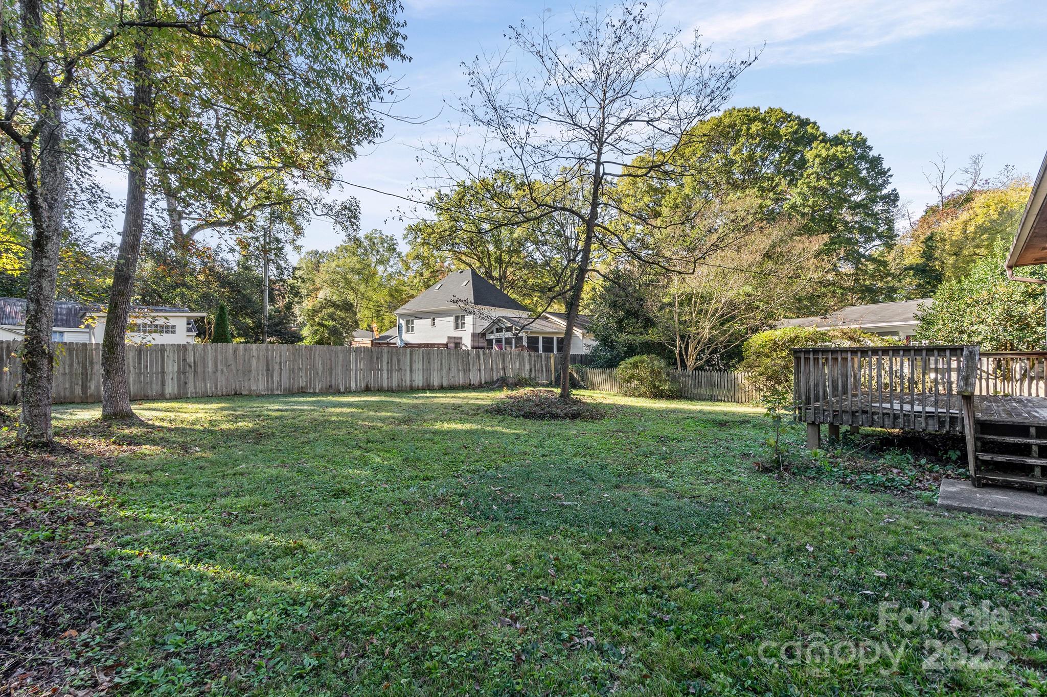 331 Meadowbrook Road Charlotte, NC 28211 - Photo 23 of 32 a view of a house with a yard and sitting area