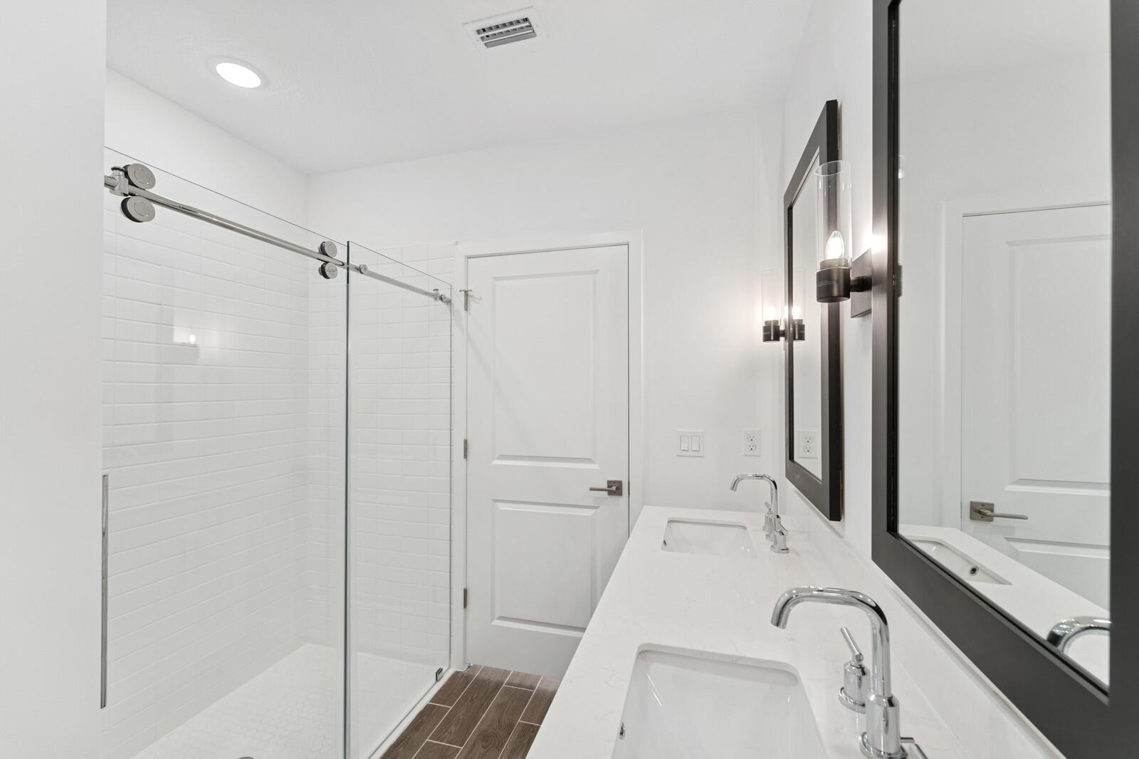 9740 Apollo Avenue, Unit 2 Fort Pierce, FL 34945 - Photo 10 of 18 a bathroom with a sink and a tub