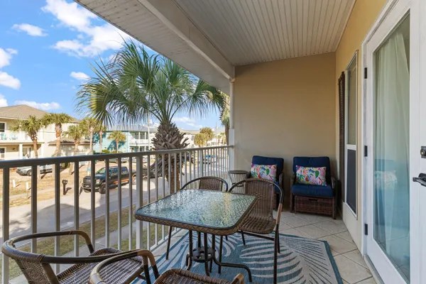 a view of a balcony dining area