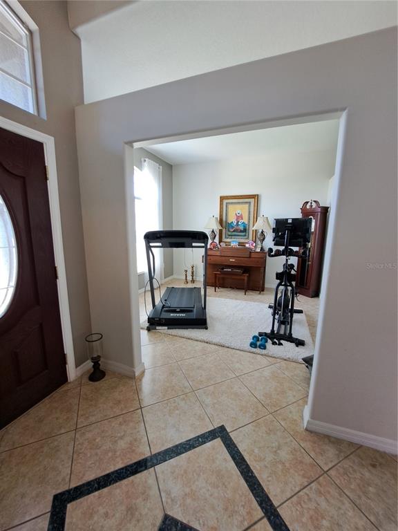 2863 Middleton Circle Kissimmee, FL 34743 - Photo 24 of 43 a view of a room with gym equipment