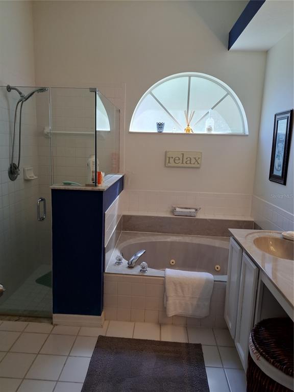 2863 Middleton Circle Kissimmee, FL 34743 - Photo 26 of 43 a bathroom with a bathtub and a sink