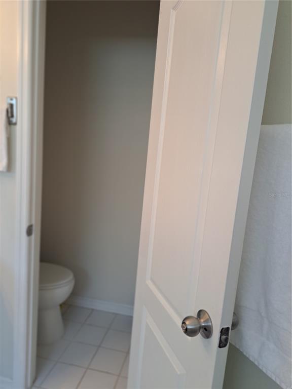 2863 Middleton Circle Kissimmee, FL 34743 - Photo 38 of 43 a bathroom with a toilet