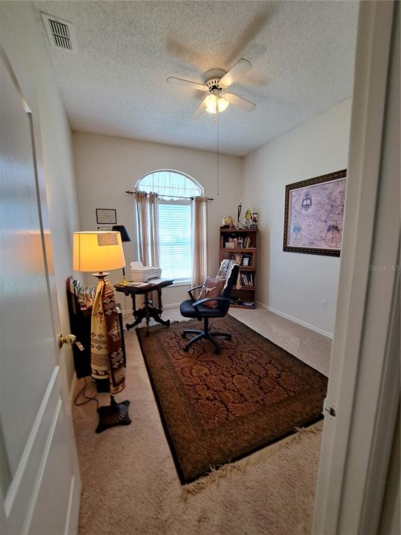 2863 Middleton Circle Kissimmee, FL 34743 - Photo 42 of 43 a view of a living room and bathroom