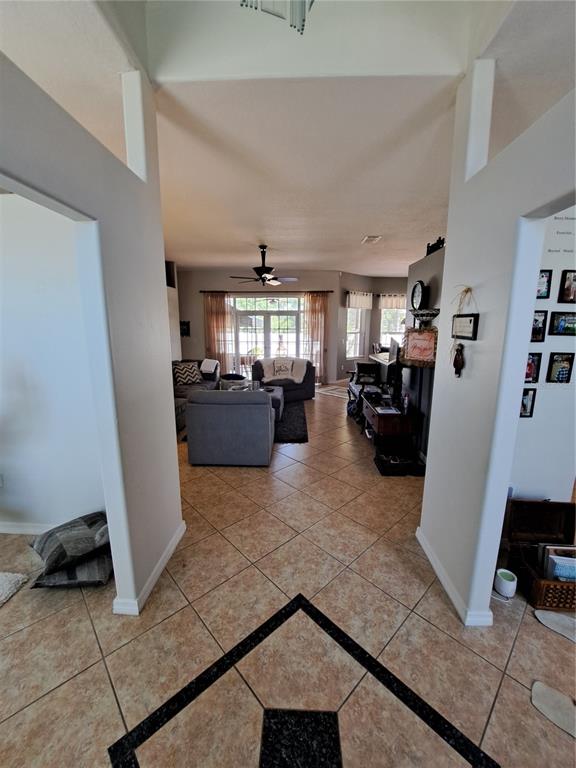 2863 Middleton Circle Kissimmee, FL 34743 - Photo 43 of 43 a view of a living room with furniture and a flat screen tv