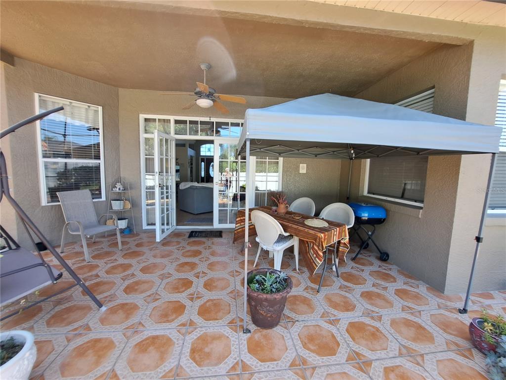 2863 Middleton Circle Kissimmee, FL 34743 - Photo 8 of 43 a dining room with table and chairs