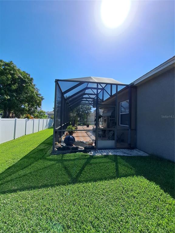 2863 Middleton Circle Kissimmee, FL 34743 - Photo 9 of 43 a view of a porch and garden