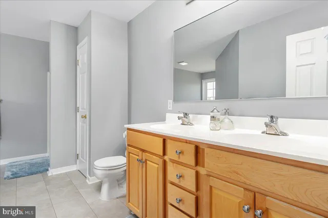 a white bath tub sitting under a window