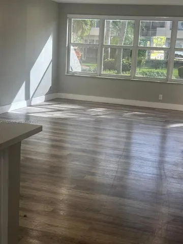 a view of street with parked cars