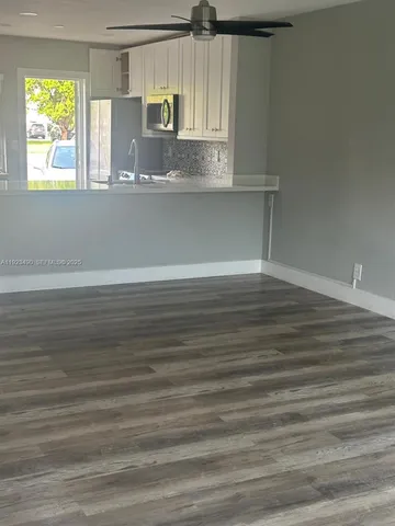 a view of yard with swimming pool