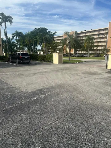 a view of door with wooden door