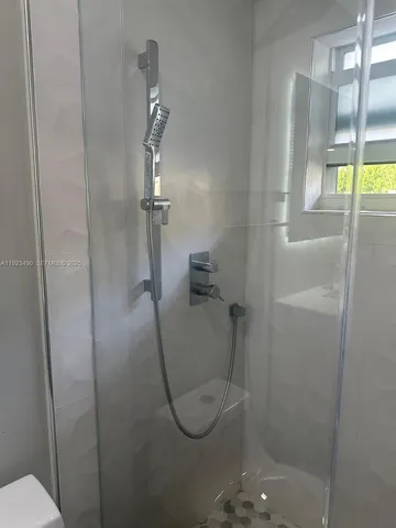 a bathroom with a bath tub