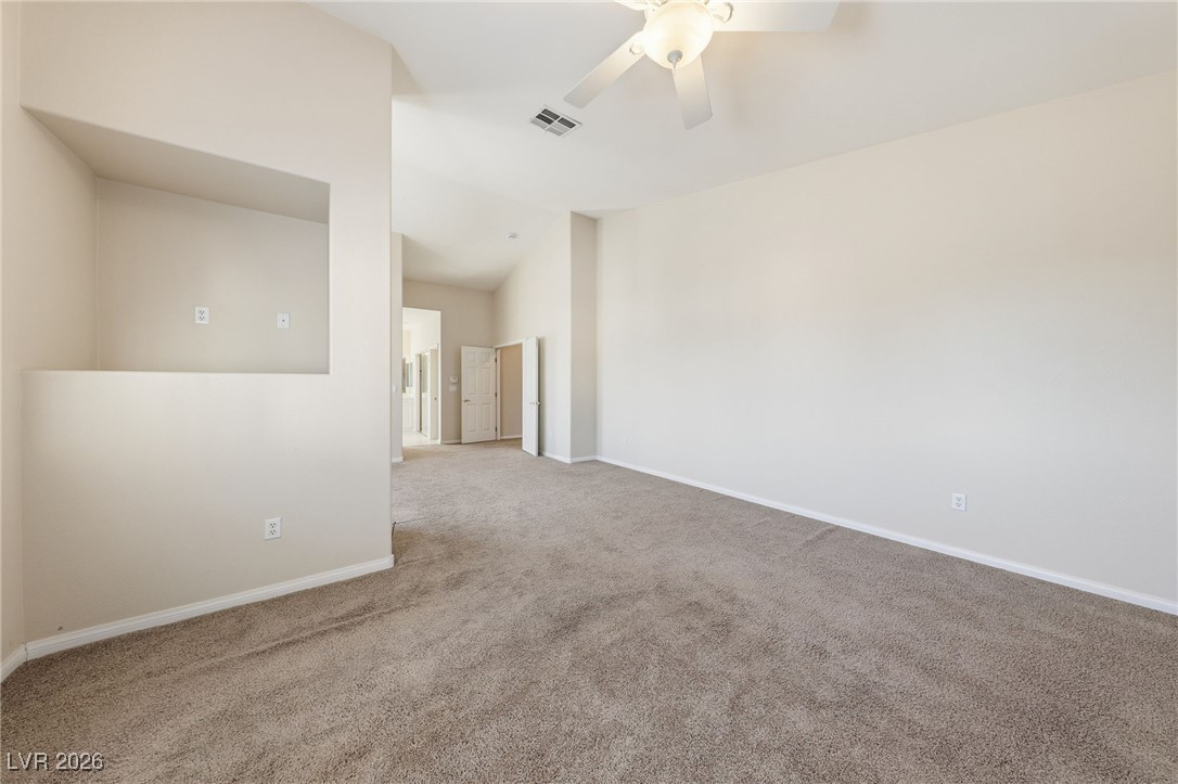 3766 Port Ritchey Street Las Vegas, NV 89147 - Photo 31 of 50 Primary Bedroom featuring ceiling fan and light carpet