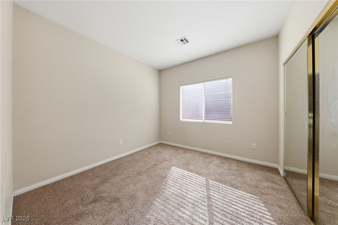3766 Port Ritchey Street Las Vegas, NV 89147 - Photo 34 of 50 Bedroom 2 with a closet and carpet
