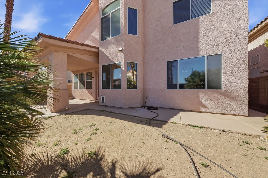 3766 Port Ritchey Street Las Vegas, NV 89147 - Photo 47 of 50 Back of house with a patio area and stucco siding