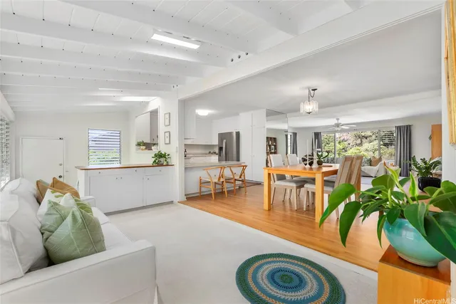 a bedroom with a bed and a night stand