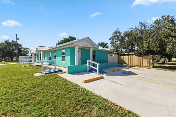 a view of a house with a patio